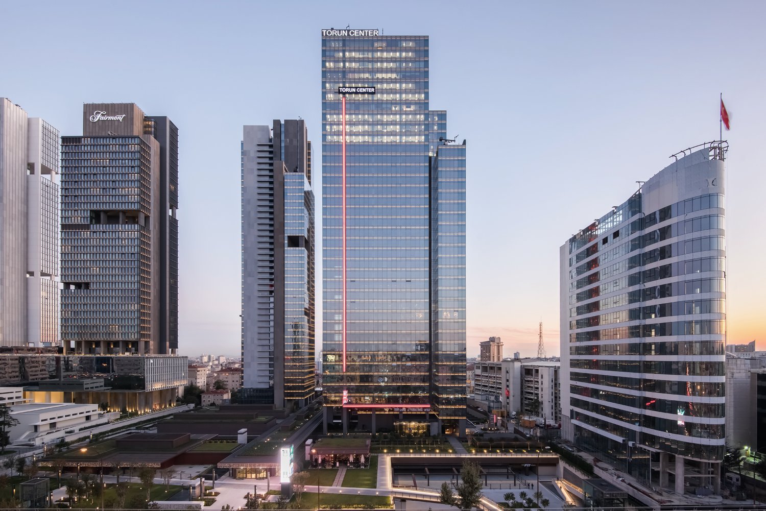 Three towers above a modern city square